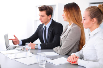 Fototapeta premium Group of Business people at meeting, focus on blond business woman