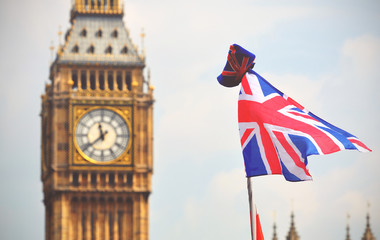 Fototapeta na wymiar Big Ben in London and English flag - toned picture
