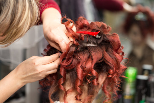 curls of hair in a beauty salon