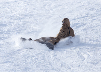 snowboarder fell in the snow