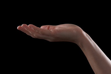 Gesture beautiful hand of a young girl, palm open up.