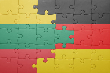 Fototapeta premium puzzle with the national flag of lithuania and germany