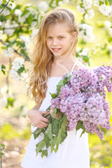 portrait of little girl outdoors in summer