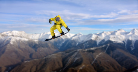 Naklejka na ściany i meble Flying skier on mountains. Extreme sport.