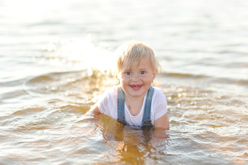 portrait of little girl outdoors in summer