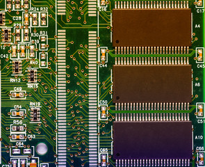 Close up of a printed green computer circuit board