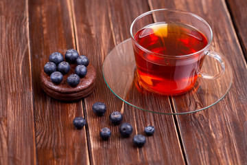 Fruit tea with cake blueberry berries