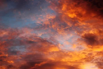 Selbstklebende Fototapete Himmel Fiery orange sunset sky.