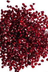 pomegranate seeds on white