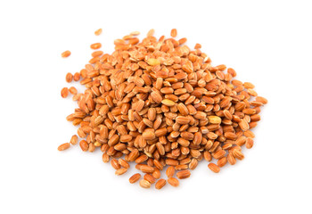 Brown millet grain over white background