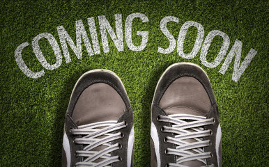 Top View of Sneakers on the grass with the text: Coming Soon