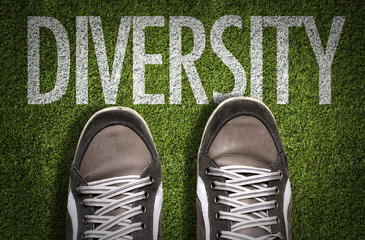 Top View of Sneakers on the grass with the text: Diversity