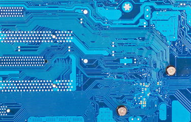 blue circuit board background of computer motherboard