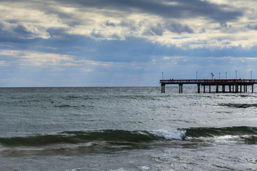 Waves Rolling into Sandy Beach