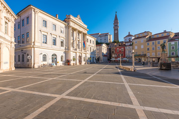 Fototapeta na wymiar Tartini Square in Piran, Slovenia on a Hot Summer Day with Clear Blue Sky