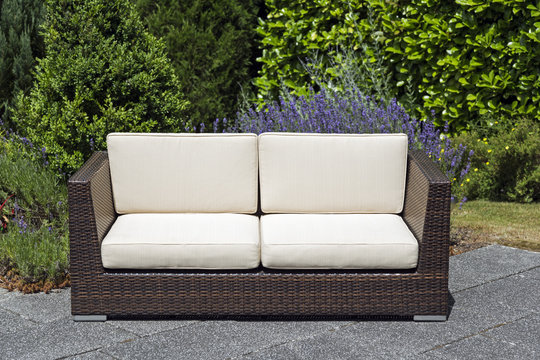 Outdoor garden furniture rattan sofa on terrace