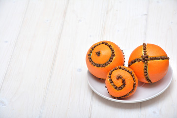 Christmas decoration - oranges with cloves