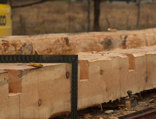 Hand carved Wooden beam under construction.