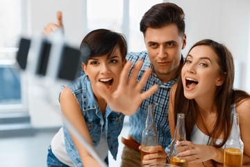 Party. Friends Making Selfie Portrait Photo Using Smartphone. Friendship, Celebration