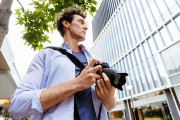 Male photographer taking picture