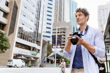 Male photographer taking picture