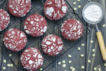 Red velvet crinkle cookies with white chocolate chips - obrazy, fototapety, plakaty