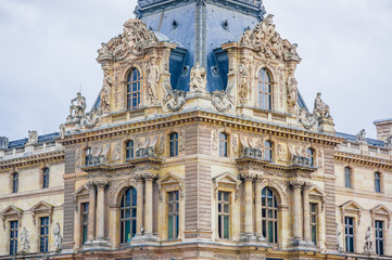 Fototapeta na wymiar Louvre Museum exterior in Paris, France