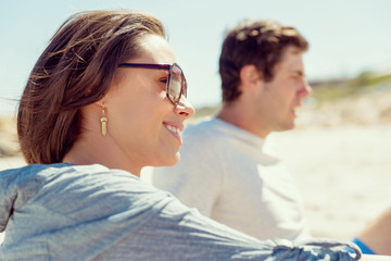Fototapeta premium Portrait of young woman on beach