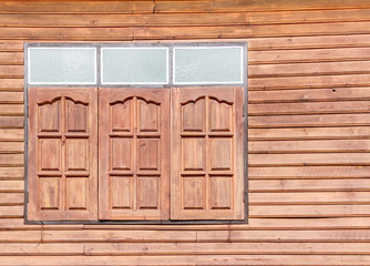 Window with brown orange old wood texture