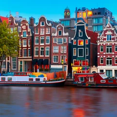 Gordijnen Night city view of Amsterdam canal  © Kavalenkava