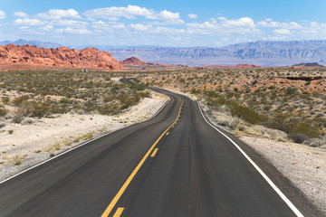 Winding road in colorful desert landscape at Valley of Fire State Park, Nevada, USA