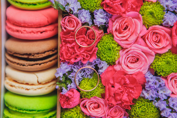 wedding rings in flowers