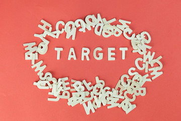 Word 'TARGET' being surrounded by scrambled random letters