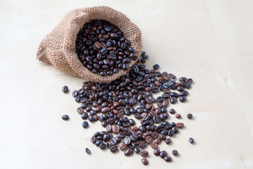 Cup of coffee and fresh roasted organic Coffee beans on isolated background, food and drink background
