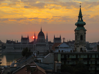 Fototapeta na wymiar View of Parliament and roofs of Budapest, Hungary