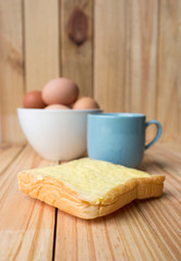 Fototapeta na wymiar breakfast on wood plate
