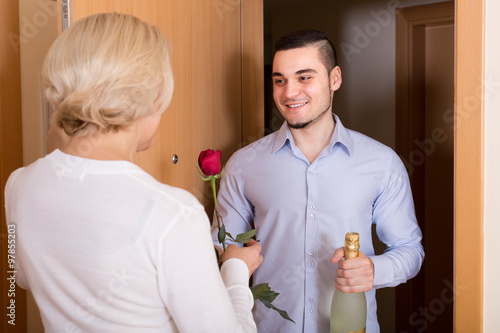 Mature Woman And Young Guy At Doorway Stock Photo And Royaltyf