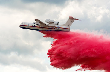 Flying aerial firefighting pour water
