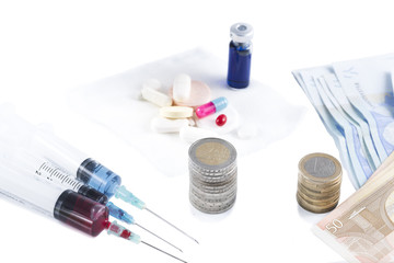 conceptual image with medicine and money.