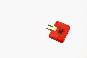 Red plug adapter, white background