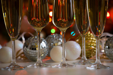 Glasses of champagne and christmas balls