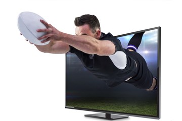 Composite image of rugby player scoring a try