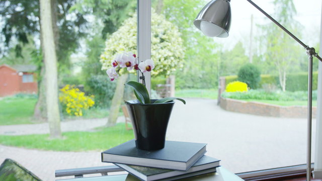  Pretty home office working space with desk and laptop computer. No people. 