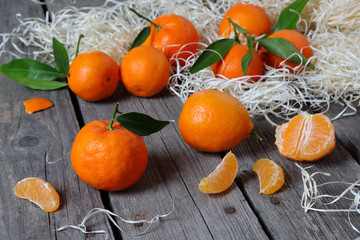 Tangerines on the gray wooden table