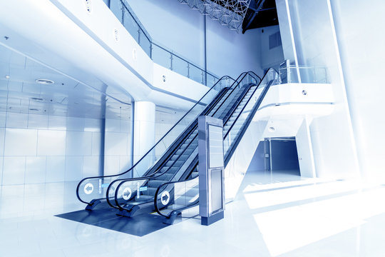Escalators in modern building.