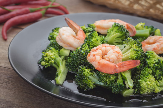 Stir fried broccoli with shrimp on plate