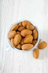 almonds on wooden surface