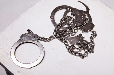 Handcuffs, Chain, White Background.