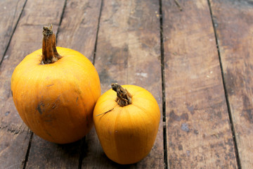 Pumpkin on wooden background - Halloween and thansgiving concept