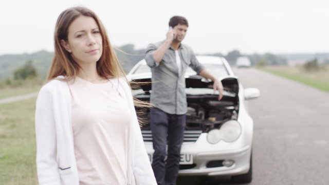  Stranded Couple With Brokendown Car Phone For Help